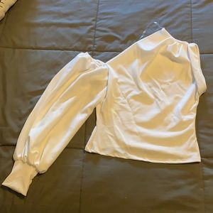 Asymmetrical white blouse.
